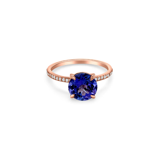 Main Image: "2.00ct Four Claw Round Tanzanite and Diamond Ring" Side View: "Round Tanzanite Gemstone Ring" Diamond Detail: "Diamond Accents on Tanzanite Ring" Elegance in Design: "Four Claw Setting with Tanzanite and Diamonds" Brilliance and Beauty: "Craftsmanship of Tanzanite and Diamond Ring"