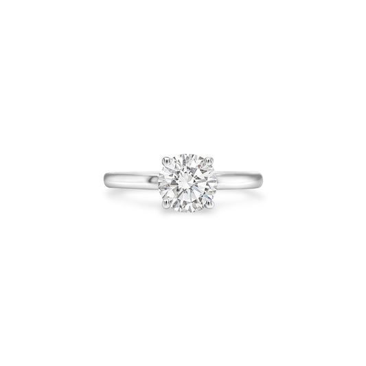 Main Image: "1.00ct Round Brilliant Diamond Solitaire Ring" Diamond Close-Up: "Close-Up of Round Brilliant Diamond" Solitaire Setting: "Classic Solitaire Setting" Ring Profile: "Side View of Diamond Solitaire Ring" Custom Liner Options: "Ring with Different Open Liners" Timeless Elegance: "Elegant Diamond Solitaire Ring
