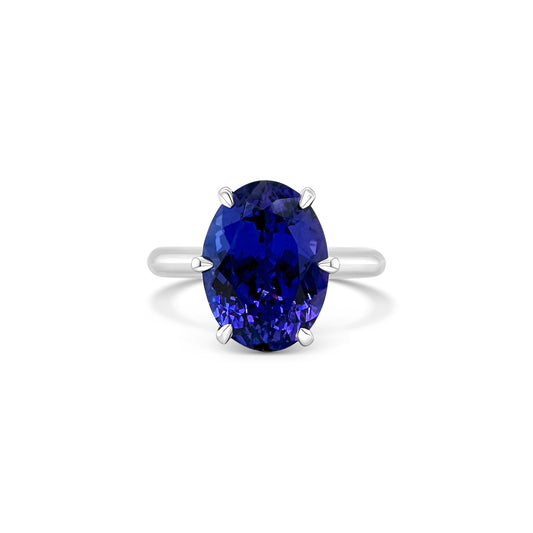 A, luxurious, oval-shaped, tanzanite, gemstone, ring, featuring, a, single, stone, set, in, a, classic, solitaire, setting, with, a, sparkling, band.