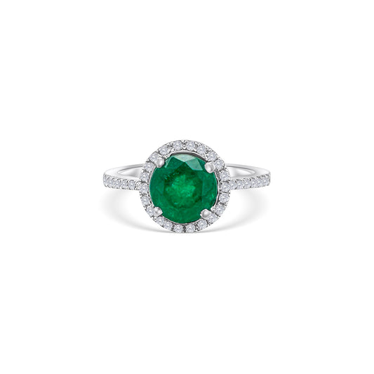 Round emerald diamond halo ring, green gemstone engagement band, elegant emerald jewelry, sparkling diamond accents, luxurious halo setting, fine jewelry gift for her.