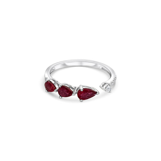 "Three-stone ruby and diamond ring, elegant jewelry, precious gemstones, red ruby, sparkling diamonds, luxury accessories, fine craftsmanship, stunning design, special occasions, statement piece, exquisite detailing, timeless beauty."