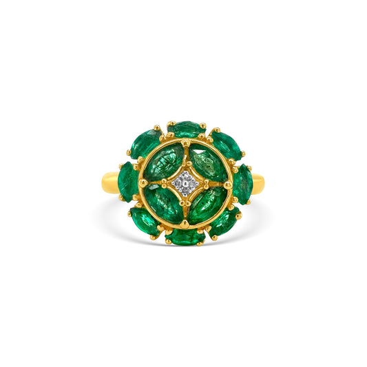  A Marquise Cut Emerald and Diamond Ring, showcasing the vibrant green of the emerald against the sparkle of the diamonds, perfect for adding elegance and sophistication to any ensemble, an exquisite piece of jewelry that exudes timeless beauty and luxury.