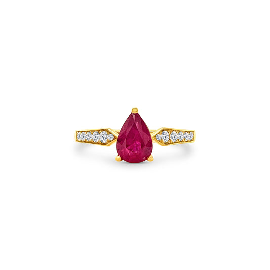 "A stunning pear-shaped ruby engagement ring," "Featuring a sparkling diamond-studded band," "Elegant and timeless design," "Perfect for special occasions or everyday wear," "Exquisite craftsmanship and attention to detail," "A symbol of love and commitment," "Sure to capture attention and admiration."