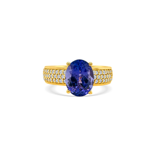 "Oval Shaped Tanzanite & Diamond Ring," "Exquisite Oval Tanzanite Diamond Ring," "Luxurious Oval Tanzanite and Diamond Jewelry," "Elegant Oval Shaped Tanzanite Ring," "Fine Jewelry with Oval Tanzanite and Diamonds," "High-Quality Tanzanite and Diamond Ring," "Statement Oval Tanzanite Diamond Ring," "Sparkling Oval Shaped Tanzanite Jewelry," "Beautiful Diamond and Tanzanite Ring," "Fashionable Oval Tanzanite & Diamond Ring."