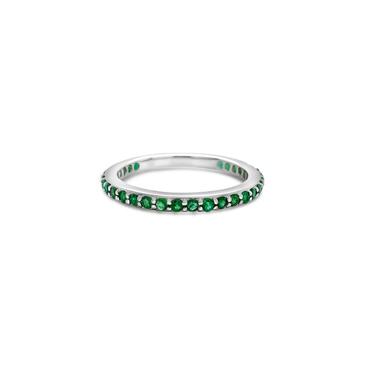 "A round, emerald eternity ring, featuring brilliant-cut emeralds, set in 18k white gold, symbolizing eternal love, timeless elegance, precious gemstones, luxurious craftsmanship."