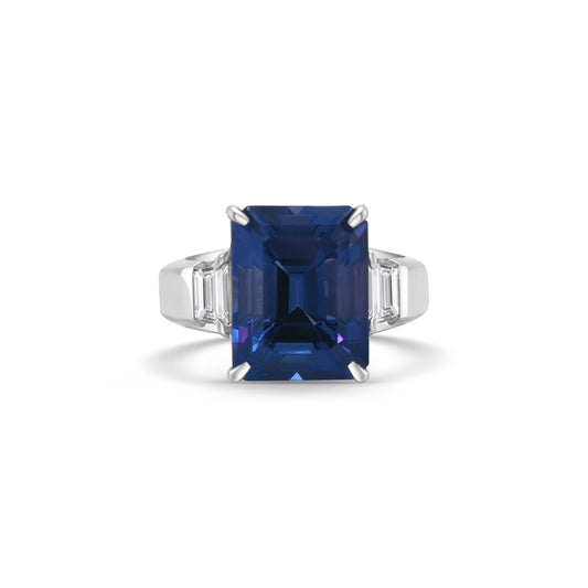 Emerald cut tanzanite ring, Trilogy ring, Diamond accent ring, Elegant gemstone jewelry, Statement piece, Luxury fashion accessory.