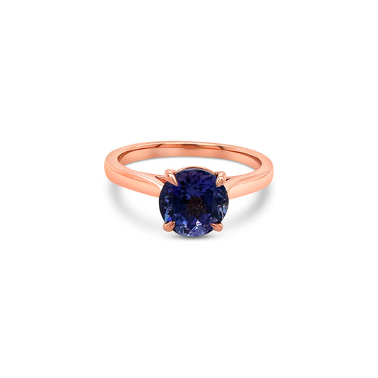 Round Tanzanite Solitaire Ring, Elegant Tanzanite Ring, Classic Solitaire Ring, Timeless Tanzanite Jewelry, Beautiful Gemstone Ring, Sophisticated Tanzanite Solitaire, Stunning Round Tanzanite Ring, Chic Solitaire Engagement Ring
