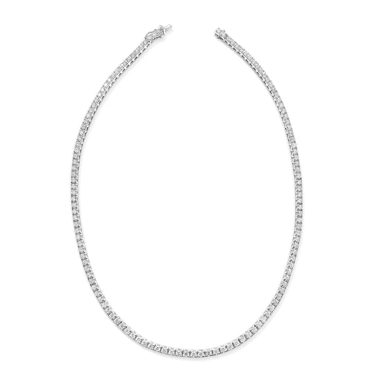  A stunning diamond tennis necklace, featuring brilliant-cut diamonds, a timeless and elegant jewelry piece, perfect for special occasions, a symbol of luxury and sophistication, meticulously crafted with precision, a dazzling accessory that adds glamour to any ensemble, a must-have for those seeking refined style, a classic design that complements both casual and formal attire, radiating timeless beauty and unmatched sparkle.