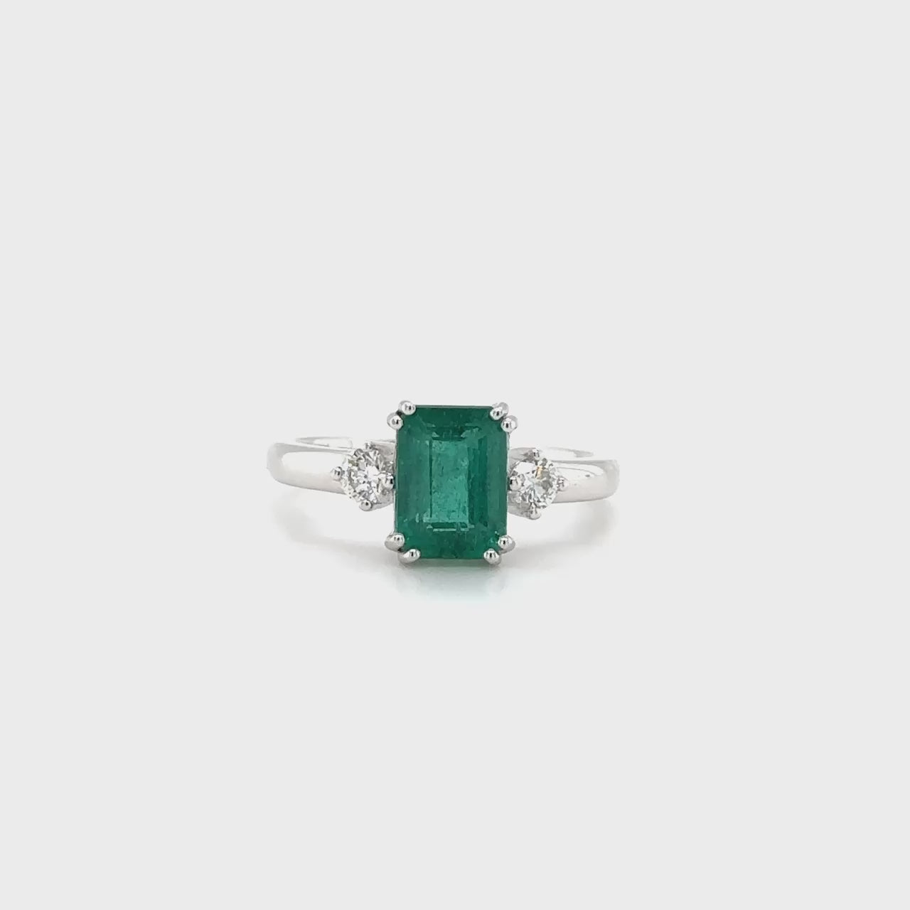 Emerald, Diamond, Trilogy Ring: A stunning piece of jewelry showcasing the brilliance of emeralds and diamonds in a trilogy setting.