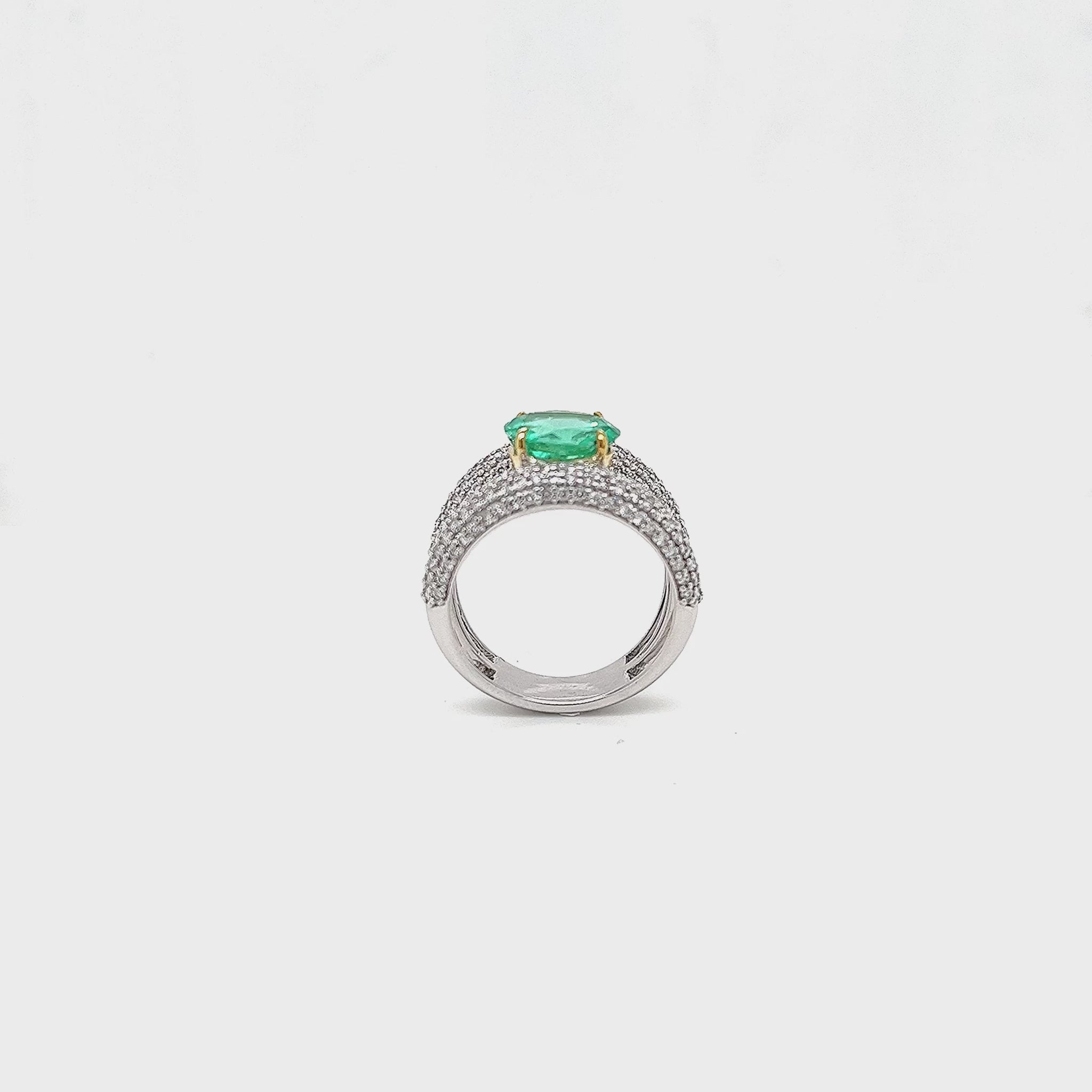 2.60ct Green Emerald and Diamond Ring" "Exquisite Green Emerald and Diamond Ring" "Captivating 2.60 Carat Emerald Ring" "Luxurious Green Gemstone Jewelry" "Elegant Emerald and Diamond Statement Ring" "High-Quality Precious Gemstone Ring" "Handcrafted Emerald and Diamond Jewelry" "Sophisticated Green Emerald Ring" "Dazzling Diamond Accents on Emerald Ring" "Fine Jewelry: Green Emerald and Diamonds"