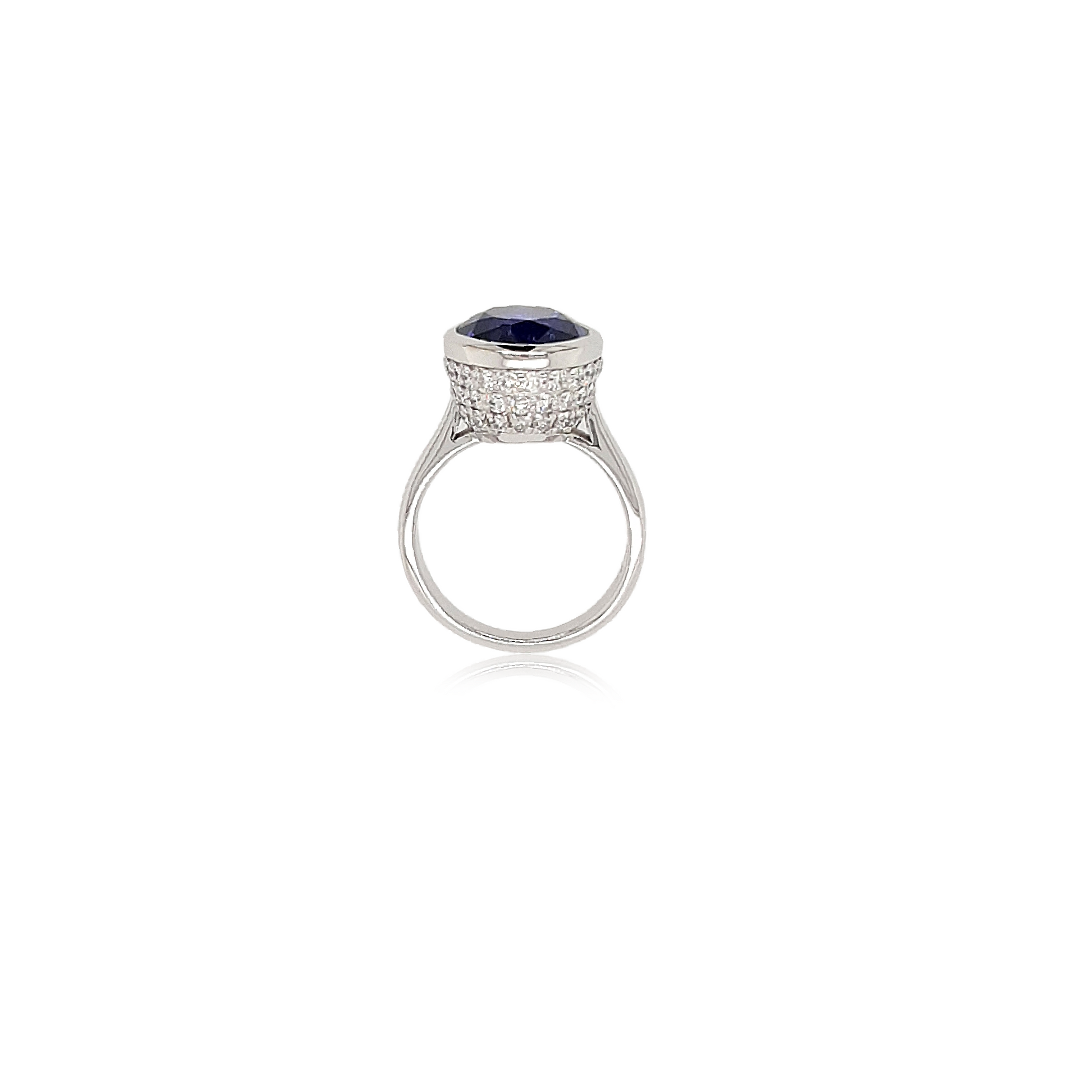 "Oval Tanzanite and Diamond Ring with Brilliant Blue Gemstone" "Elegant Oval Tanzanite Ring Accented with Sparkling Diamonds" "Tanzanite Engagement Ring Featuring an Oval Gemstone and Diamonds" "Luxurious Oval Tanzanite and Diamond Cocktail Ring" "Oval Cut Tanzanite Ring Surrounded by Glittering Diamond Accents" "Exquisite Oval Tanzanite and Diamond Halo Ring" "Oval Tanzanite Engagement Ring with Diamond Pave Setting" "Oval Tanzanite and Diamond Statement Ring for a Touch of Glamour"
