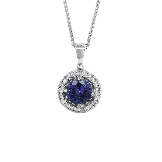 A luxurious Round Cut Tanzanite pendant, adorned with a sparkling Diamond Halo. Elegant jewelry featuring a brilliant Tanzanite surrounded by glistening Diamonds. Exquisite Round Tanzanite pendant with a Diamond Halo for a touch of glamour. Stunning Diamond-encrusted Halo pendant showcasing a Round Cut Tanzanite centerpiece. Tanzanite and Diamond pendant, a perfect blend of sophistication and brilliance.