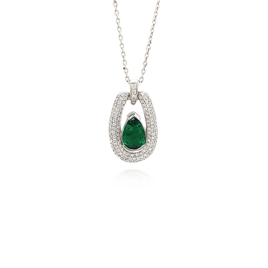 A stunning, pear-shaped emerald pendant, exquisite diamond detailing, elegant jewelry piece, floating design, luxurious emerald and diamond combination, eye-catching gemstone pendant, sophisticated jewelry accessory, radiant pear-cut emerald, sparkling diamond accents, timeless and chic pendant.