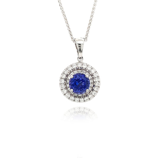 A stunning Round Double Halo Tanzanite Pendant, showcasing vibrant blue hues, surrounded by sparkling diamonds, a perfect statement piece for elegant occasions, crafted with precision and attention to detail, exquisite jewelry with a timeless allure, a luxurious accessory that captures the essence of sophistication and beauty.