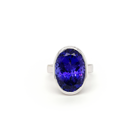 "Oval Solitaire Tanzanite Ring on White Background" "Elegant Tanzanite Engagement Ring with Oval Solitaire Setting" "Beautiful Blue Tanzanite Ring in Oval Cut" "Sterling Silver Tanzanite Solitaire Ring for Women" "Handcrafted Oval Tanzanite Engagement Ring" "Tanzanite Gemstone Solitaire Ring in Oval Shape" "Luxurious Oval Tanzanite Ring for Special Occasions" "Classic Oval Cut Tanzanite Ring in a Solitaire Setting"