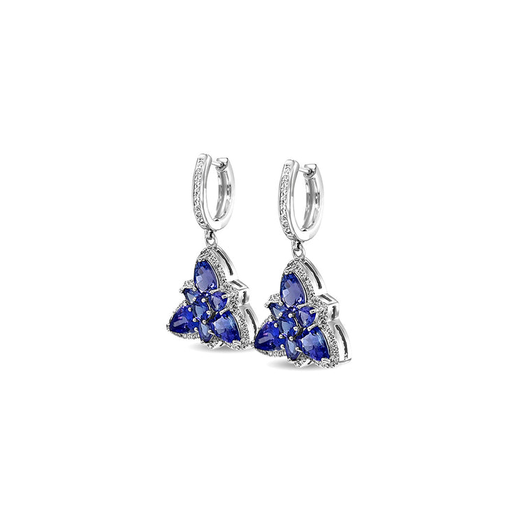 Floral Tanzanite Drop Earrings: Exquisite Tanzanite Gemstone, Elegant Floral Design, Dazzling Drop Style, Sterling Silver Setting, Sparkling Statement Jewelry, Unique Floral Elegance, Beautiful Gemstone Earrings, Feminine and Timeless, Handcrafted Floral Delight, Stunning Tanzanite Accents.