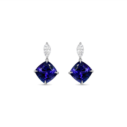 Main Image: "6.30ct Cushion Tanzanite & Diamond Drop Earrings" Tanzanite Detail: "Captivating Cushion Tanzanite Gemstone" Diamond Halo: "Halo of Diamonds Enhancing Tanzanite Drop Earrings" Earring Profile: "Cushion Tanzanite & Diamond Drop Earrings Profile" Customizable Liners: "Earrings with Different Open Liner Options" Luxurious Presentation: "Elegantly Designed Cushion Tanzanite & Diamond Earrings