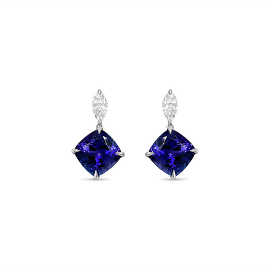 Main Image: "6.30ct Cushion Tanzanite & Diamond Drop Earrings" Tanzanite Detail: "Captivating Cushion Tanzanite Gemstone" Diamond Halo: "Halo of Diamonds Enhancing Tanzanite Drop Earrings" Earring Profile: "Cushion Tanzanite & Diamond Drop Earrings Profile" Customizable Liners: "Earrings with Different Open Liner Options" Luxurious Presentation: "Elegantly Designed Cushion Tanzanite & Diamond Earrings