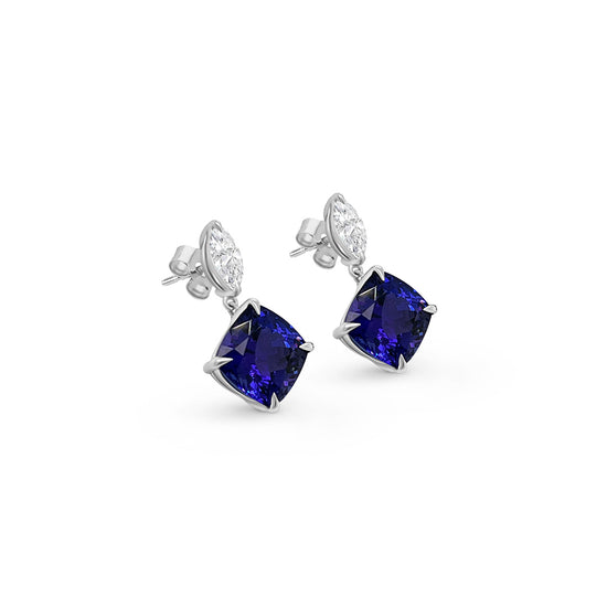 Main Image: "6.30ct Cushion Tanzanite & Diamond Drop Earrings" Tanzanite Detail: "Captivating Cushion Tanzanite Gemstone" Diamond Halo: "Halo of Diamonds Enhancing Tanzanite Drop Earrings" Earring Profile: "Cushion Tanzanite & Diamond Drop Earrings Profile" Customizable Liners: "Earrings with Different Open Liner Options" Luxurious Presentation: "Elegantly Designed Cushion Tanzanite & Diamond Earrings