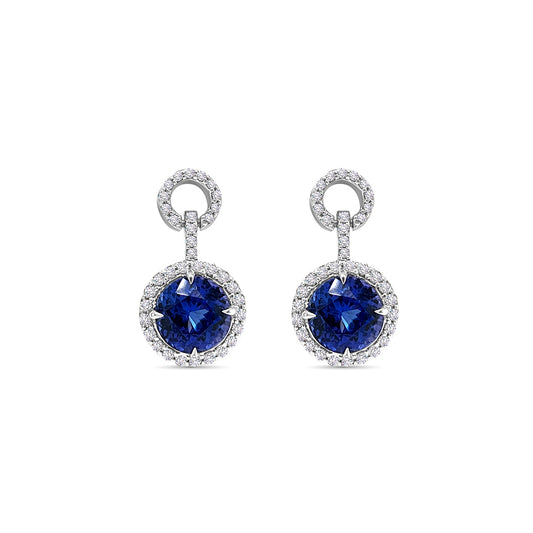 Exquisite Tanzanite and Diamond Halo Drop Earrings, sparkling gemstone jewelry, luxurious blue-violet tanzanite stones, brilliant diamonds in a halo setting, elegant and sophisticated design, statement earrings for special occasions, dazzling gemstone accessories, fine craftsmanship in precious metals, refined and glamorous jewelry pieces, perfect for adding a touch of glamour to any ensemble