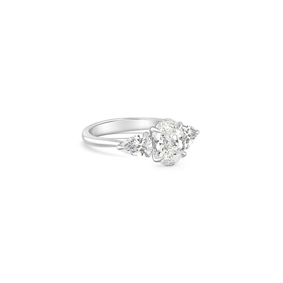 2.00ct Diamond Trilogy Ring, Oval and Pear Shape Diamonds, Engagement Ring, Anniversary Jewelry, Trilogy Design, Precious Metal Band, Timeless Elegance, Luxury Jewelry, Romance and Commitment, Bridal Ring, Diamond Trilogy, Pear and Oval Cut, Stunning Diamond Ring
