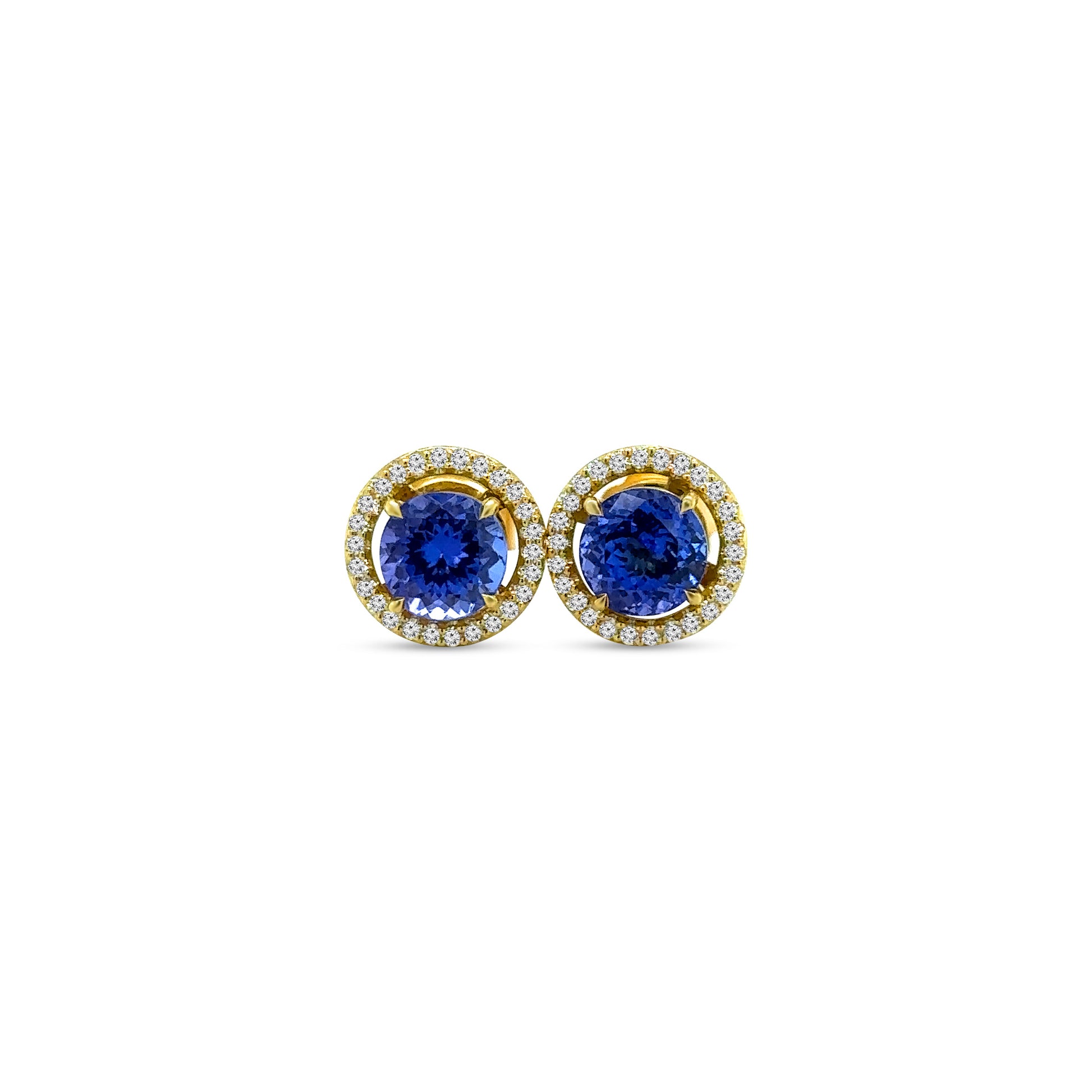 Tanzanite and Diamond Halo Stud Earrings, exquisite gemstone jewelry, elegant stud earrings, vibrant tanzanite stones, brilliant diamonds, sophisticated halo design, luxurious accessories, timeless elegance, fine craftsmanship, statement jewelry, radiant sparkle.