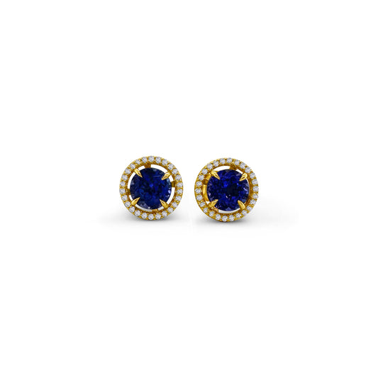 Exquisite round Tanzanite stud earrings, surrounded by a dazzling halo of brilliant diamonds. Elegant jewelry for special occasions, featuring vibrant Tanzanite gems and sparkling diamond accents. Stunning halo design, showcasing the beauty of round Tanzanite stones, complemented by the brilliance of diamonds. Perfect accessories to add a touch of glamour and sophistication to any ensemble