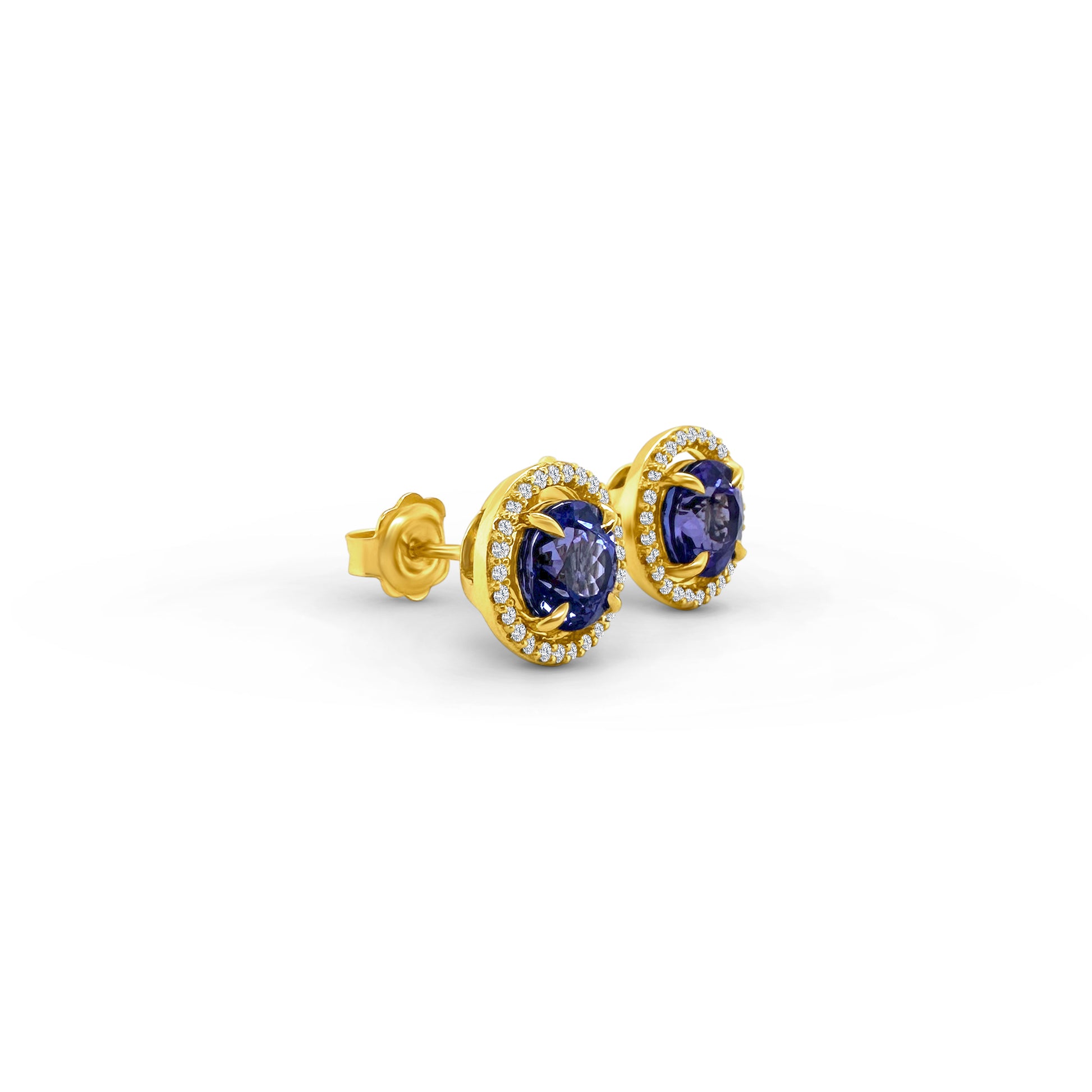 Exquisite round Tanzanite stud earrings, surrounded by a dazzling halo of brilliant diamonds. Elegant jewelry for special occasions, featuring vibrant Tanzanite gems and sparkling diamond accents. Stunning halo design, showcasing the beauty of round Tanzanite stones, complemented by the brilliance of diamonds. Perfect accessories to add a touch of glamour and sophistication to any ensemble