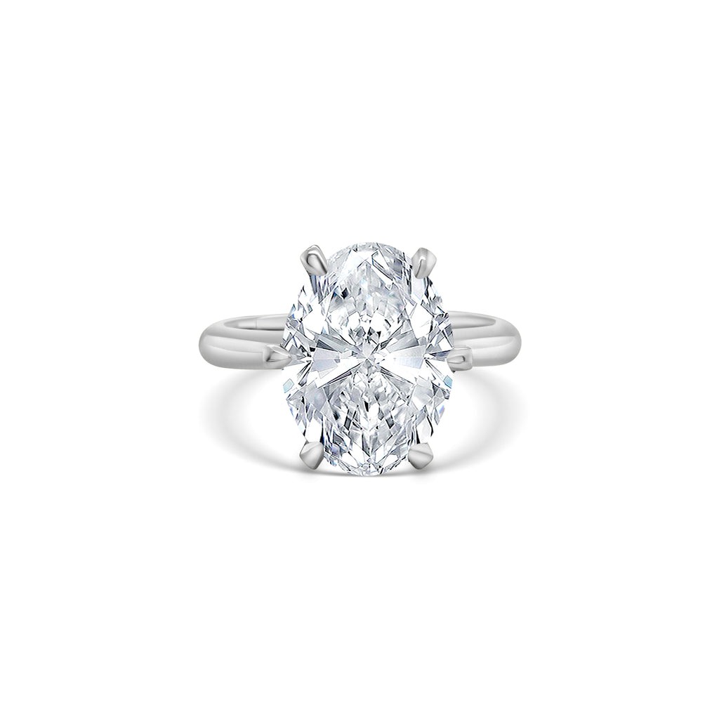 A, shimmering, oval, solitaire, diamond, ring, glitters, gracefully, on, a, finger, adorned, with, elegance, and, sophistication, perfect, for, engagements, or, special, occasions