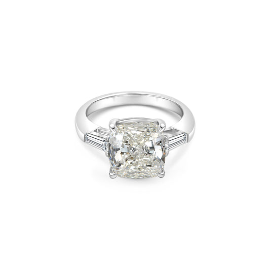 Cushion & Tapered Baguette Trilogy Diamond Ring": "Cushion cut diamond ring, Tapered baguette diamonds, Trilogy diamond ring.