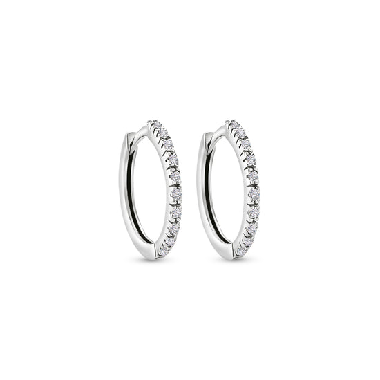 "Round Brilliant Diamond Earrings," "Huggy Earrings," "Diamond Stud Earrings," "Small Diamond Hoops," "Classic Diamond Jewelry," "Everyday Diamond Earrings," "Diamond Huggie Hoops," "Timeless Diamond Accessories."