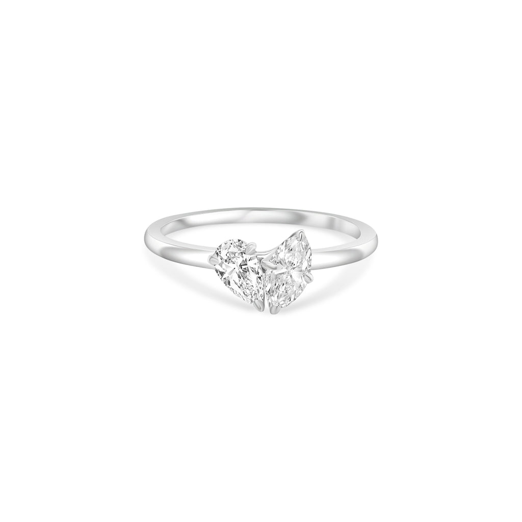 "Two stone diamond ring, Pear cut diamond ring, Marquise cut diamond ring, Elegant diamond ring, Diamond engagement ring, Sparkling diamond ring, Sophisticated diamond ring, Diamond jewelry, Fine jewelry, Luxury ring."