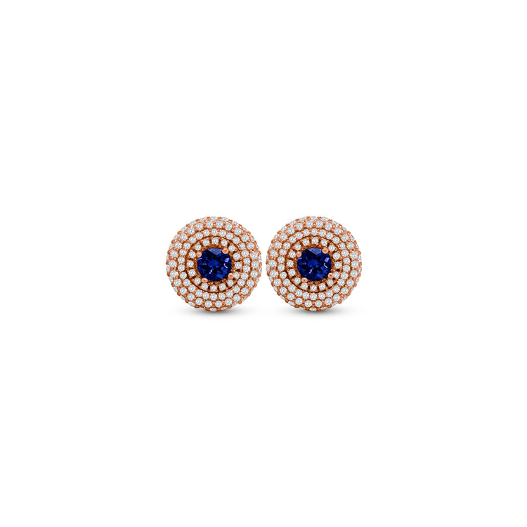 Exquisite Round Tanzanite Triple Halo Diamond Studs, elegant gemstone earrings, luxurious Tanzanite studs, sparkling diamond accents, triple halo design, statement jewelry, fine gemstone studs, sophisticated earrings, radiant Tanzanite stones, dazzling diamond brilliance.