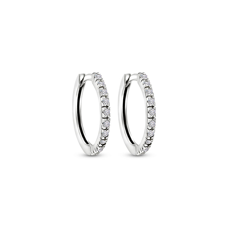 Huggy Style Earrings," "Diamond Studs," "Small Diamond Hoops," "Classic Diamond Huggies," "Timeless Diamond Jewelry," "Elegant Diamond Earrings," "Sparkling Diamond Studs," "Versatile Diamond Hoops," "Chic Diamond Accessories