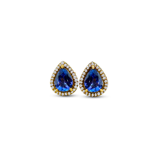 "pear-shaped tanzanite earrings, diamond halo studs, fine jewelry, gemstone studs, elegant accessories, luxury earrings, precious stones, halo setting, pear-cut gems, sparkling diamonds, glamorous earrings, statement jewelry"