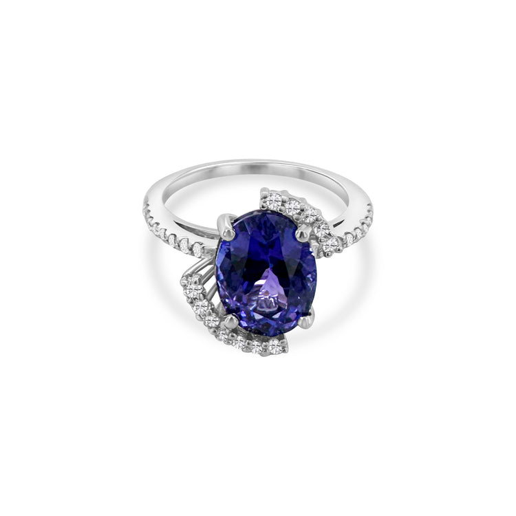 Oval Shape Tanzanite & Diamond Halo Ring