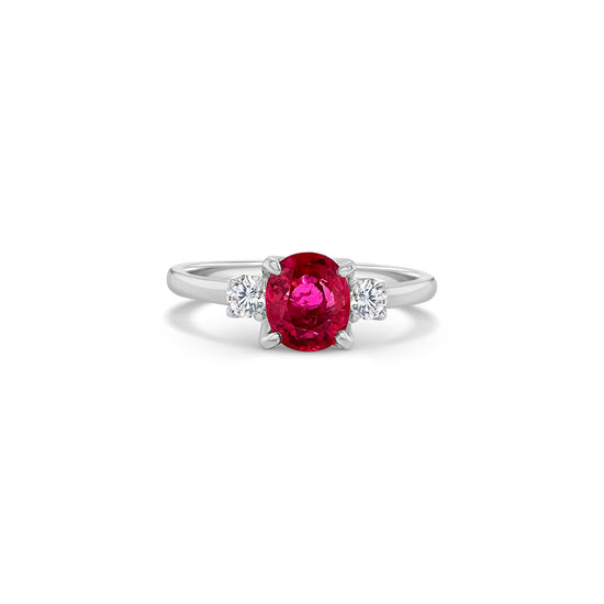 "pear shape ruby ring, diamond ring, gemstone jewelry, red gemstone ring, luxury jewelry, statement ring, precious stone ring, anniversary gift, engagement ring, fine jewelry, unique design, cocktail ring, pear cut gemstone, elegant accessory"