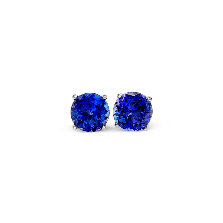 Round Tanzanite stud earrings, sparkling Tanzanite studs, elegant Tanzanite ear studs, precious Tanzanite gems, classic round Tanzanite earrings, beautiful blue Tanzanite studs, stunning Tanzanite jewelry, dainty Tanzanite studs, exquisite round Tanzanite earrings, vibrant Tanzanite studs.