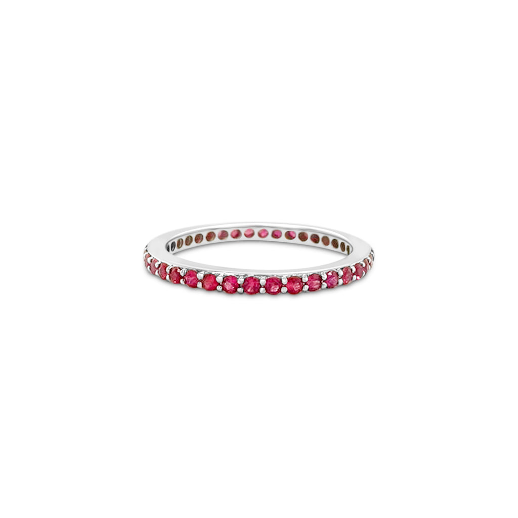 "Round Ruby Eternity Ring," "Ruby Eternity Band," "Red Gemstone Ring," "Eternity Ring with Rubies," "Round Cut Ruby Ring," "Elegant Ruby Jewelry," "Luxury Ruby Ring," "Gemstone Eternity Ring," "Fine Ruby Accessories," "Statement Ruby Ring," "High-Quality Ruby Jewelry.