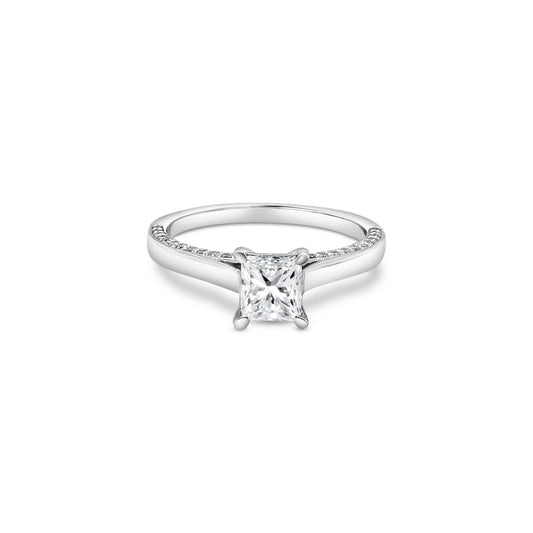 "A stunning cushion-cut diamond ring," "a luxurious solitaire engagement ring," "a sparkling diamond ring for special occasions," "an elegant cushion-cut solitaire ring," "a timeless diamond ring design," "a classic cushion-cut diamond engagement ring."