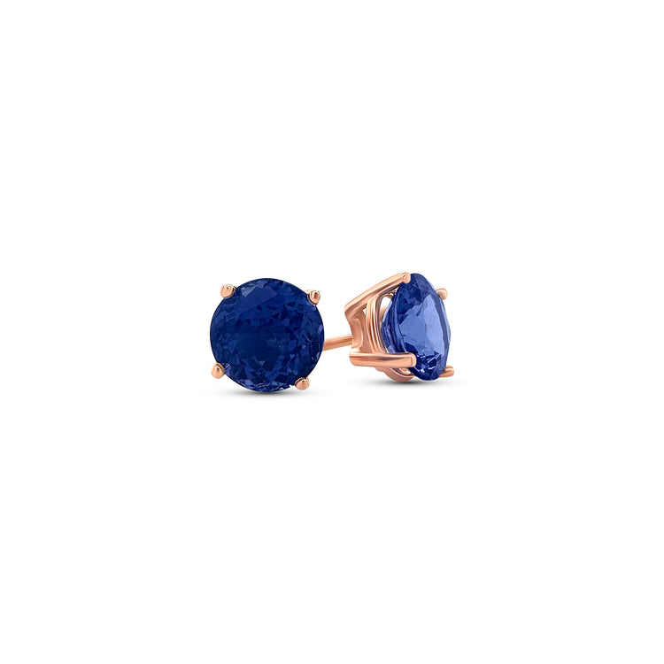 "Round Tanzanite Stud Earrings," "Tanzanite Studs," "Tanzanite Jewelry," "Gemstone Earrings," "Elegant Tanzanite Studs," "Classic Tanzanite Jewelry," "Round Gemstone Earrings," "Tanzanite Accessories," "Stylish Stud Earrings," "Blue Gemstone Studs."