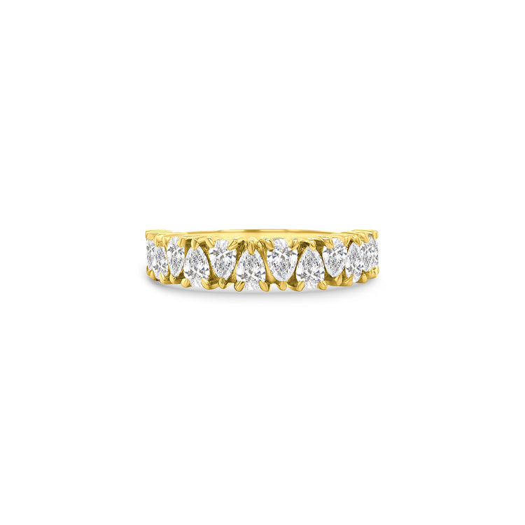 A pear-shaped half eternity diamond ring, perfect for adding elegance to any ensemble. Featuring shimmering diamonds set along the band, this ring exudes timeless charm and sophistication. Ideal for both everyday wear and special occasions, it effortlessly captures the essence of everlasting love and style.