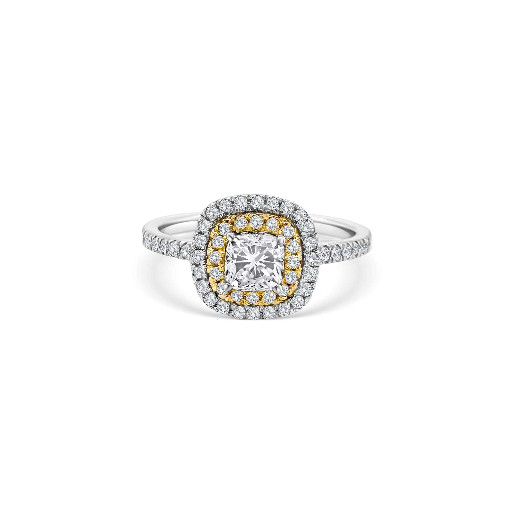 A stunning cushion-cut diamond ring, featuring a double halo design, crafted to perfection, ideal for special occasions, showcasing timeless elegance, with brilliant sparkle, making a statement, symbolizing everlasting love.