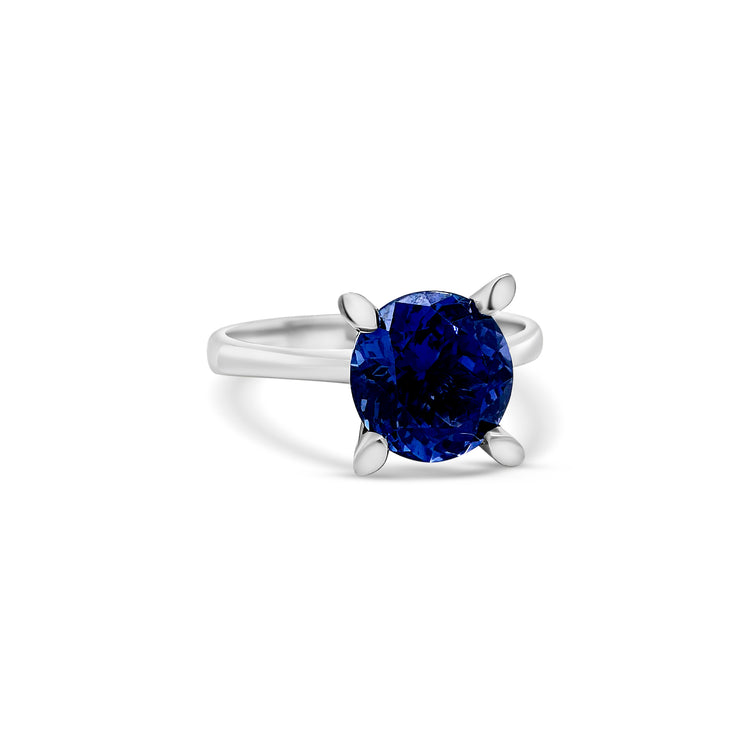 "Round Tanzanite Solitaire Ring," "Exquisite Round Tanzanite Solitaire Ring," "Luxurious Tanzanite Solitaire Engagement Ring," "Elegant Round Tanzanite Ring," "Fine Jewelry with Round Tanzanite," "High-Quality Tanzanite Solitaire Ring," "Statement Round Tanzanite Ring," "Sparkling Tanzanite Solitaire Ring," "Beautiful Round Tanzanite Engagement Ring," "Fashionable Tanzanite Solitaire Ring."