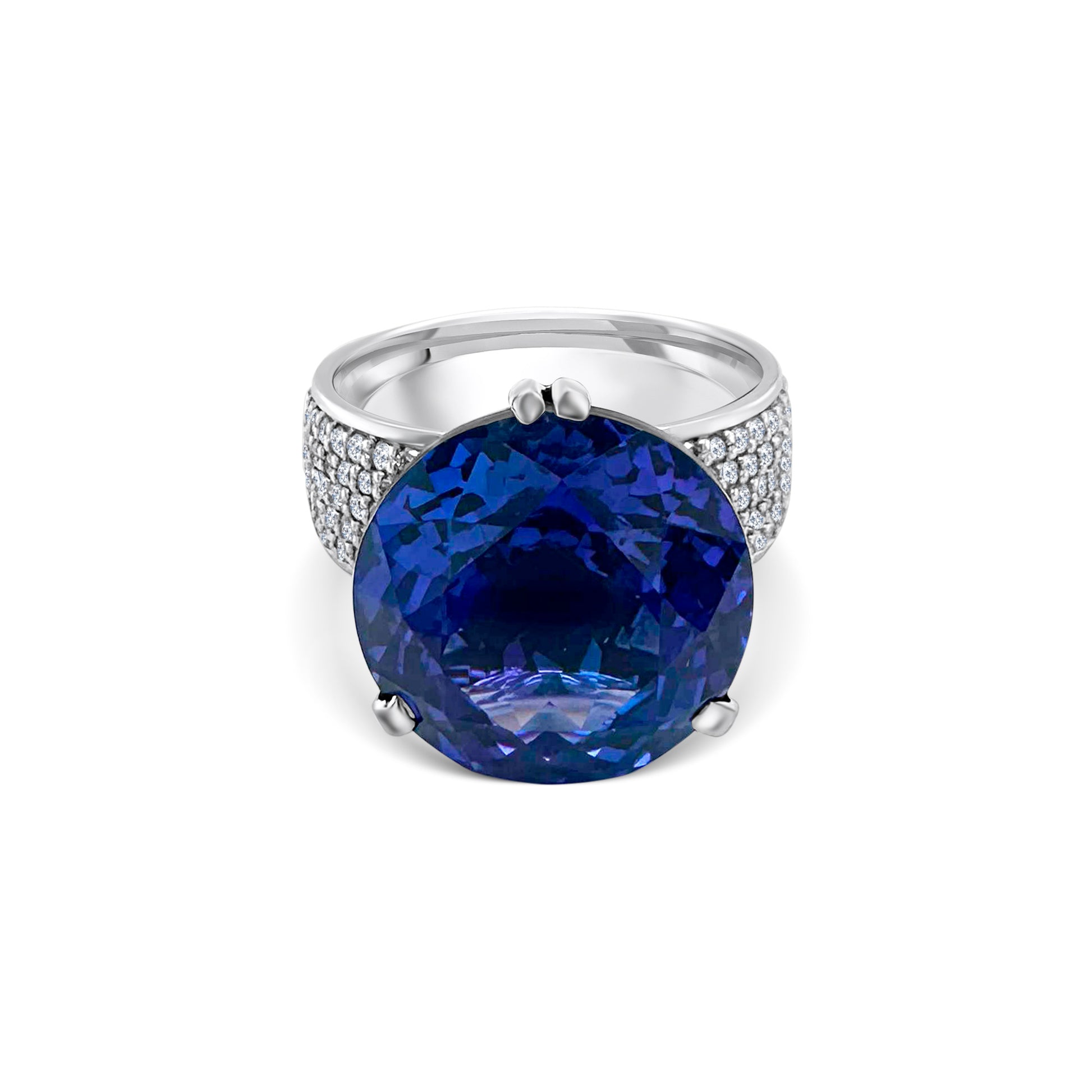 "Round Brilliant Cut Tanzanite & Diamond Ring," "Tanzanite and Diamond Ring," "Fine Jewelry," "Luxury Ring," "Fashion Ring," "Gemstone Jewelry," "Sparkling Diamond Ring," "Statement Ring," "Elegant Jewelry," "Special Occasion Ring," "Round Cut Tanzanite Ring," "Timeless Jewelry," "Handcrafted Ring," "Unique Gemstone Ring," "Classic Diamond Ring."