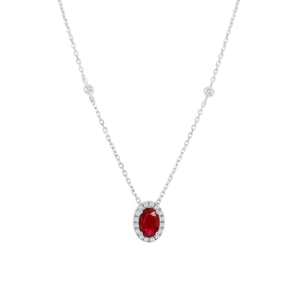 Oval ruby pendant, Diamond halo necklace, Gemstone jewelry, Elegant accessory, Statement piece, Fine jewelry gift, Sparkling gem pendant, Luxury jewelry, Red gemstone necklace, Precious stone pendant.