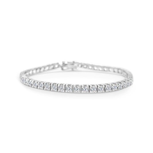 A stunning diamond tennis bracelet, featuring brilliant diamonds, perfect for any occasion, adding elegance and glamour to your look, a timeless accessory, sparkling with every movement, exuding sophistication and luxury, a must-have piece for every jewelry collection.