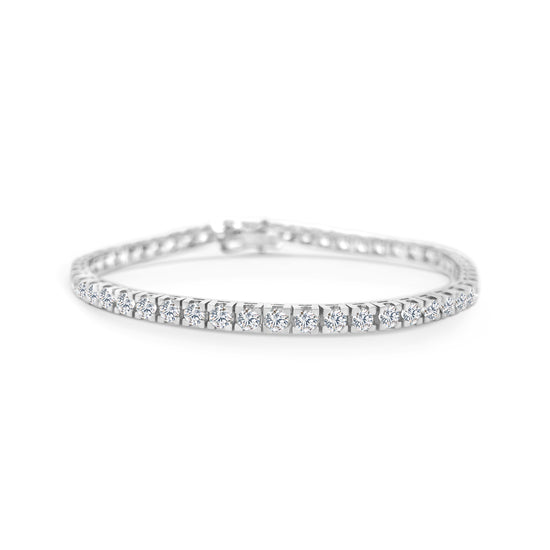 A stunning diamond tennis bracelet, featuring brilliant diamonds, perfect for any occasion, adding elegance and glamour to your look, a timeless accessory, sparkling with every movement, exuding sophistication and luxury, a must-have piece for every jewelry collection.