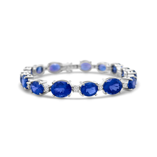  Oval Tanzanite & Diamond Bracelet, Tanzanite Bracelet, Diamond Bracelet, Oval Tanzanite Jewelry, Tanzanite and Diamond Bracelet, Gemstone Bracelet, Elegant Tanzanite Bracelet, Tanzanite Bracelet for Women, Fine Jewelry Bracelet, Luxury Tanzanite Bracelet, Tanzanite Gemstone Bracelet, Oval Tanzanite Gemstone, Tanzanite and Diamond Jewelry, Women's Tanzanite Bracelet, Tanzanite Bracelet with Diamonds.