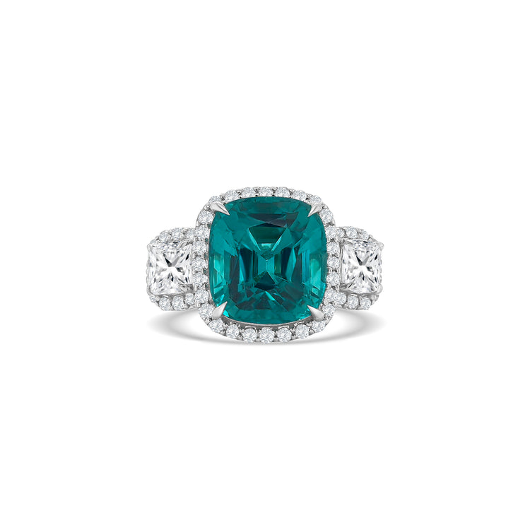 "Paraiba Tourmaline & Diamond Trilogy Halo Ring," "Tourmaline and Diamond Ring," "Fine Jewelry," "Luxury Ring," "Fashion Ring," "Gemstone Jewelry," "Sparkling Halo Ring," "Statement Ring," "Elegant Jewelry," "Special Occasion Ring," "Paraiba Tourmaline Ring," "Timeless Jewelry," "Handcrafted Ring," "Unique Gemstone Ring," "Classic Halo Ring."